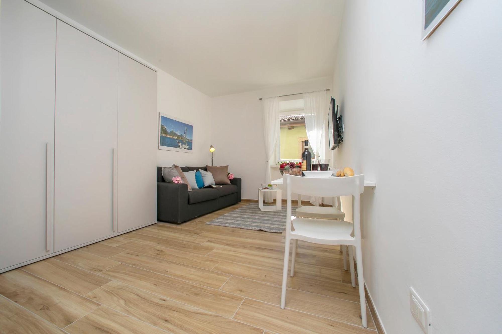 Nido Sui Tetti Di Riva Del Garda - Happy Rentals Dış mekan fotoğraf