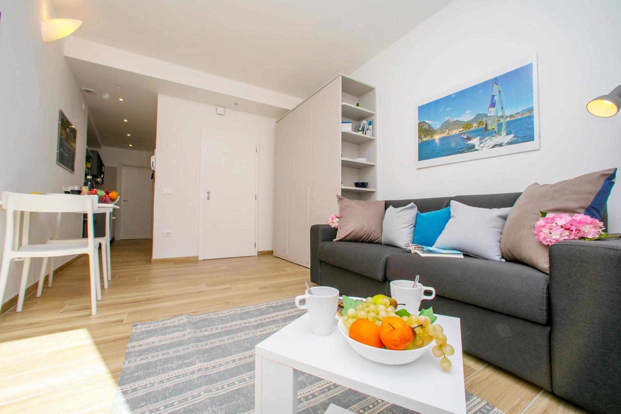 Nido Sui Tetti Di Riva Del Garda - Happy Rentals Dış mekan fotoğraf